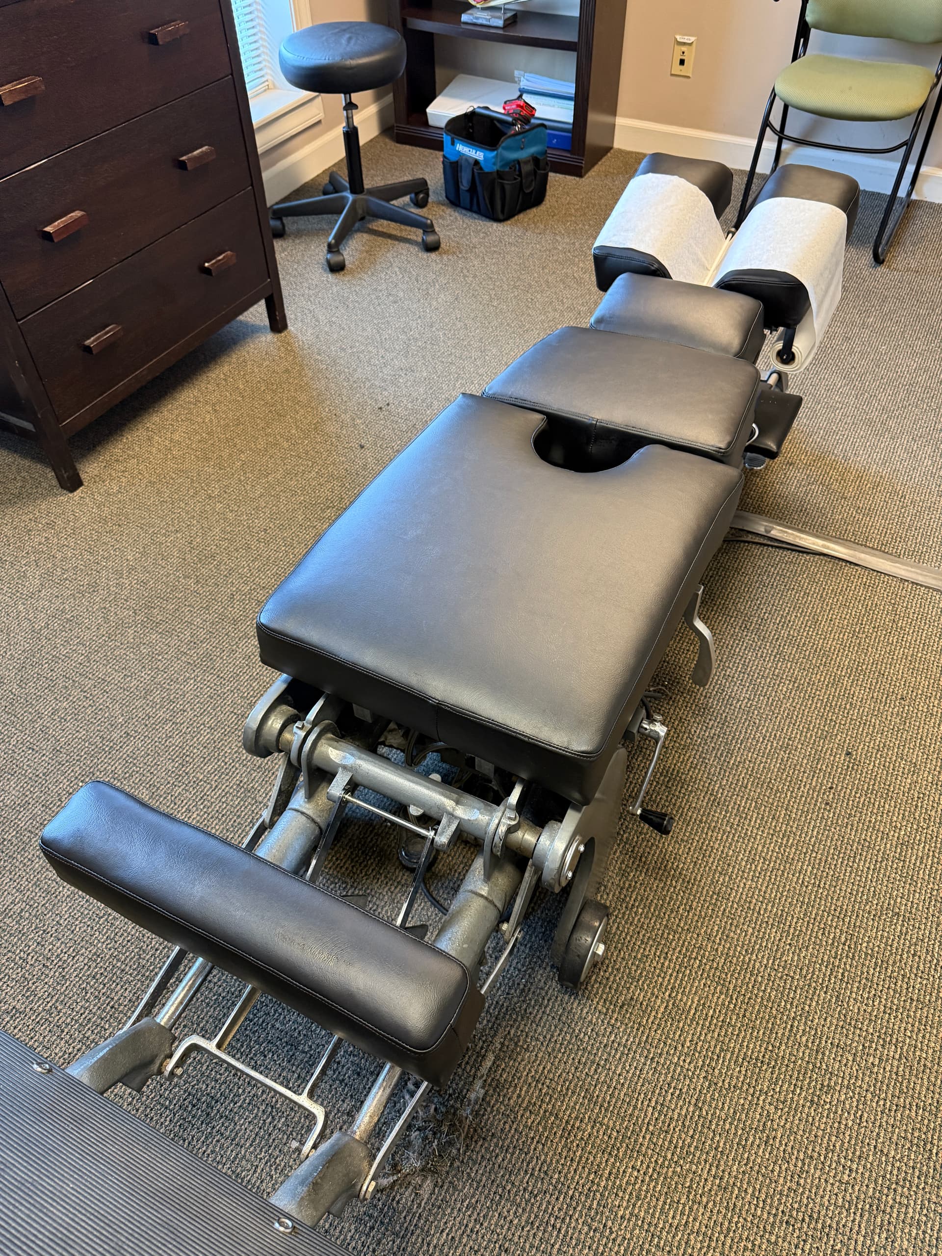 Chiropractic table and headrest with refreshed upholstery