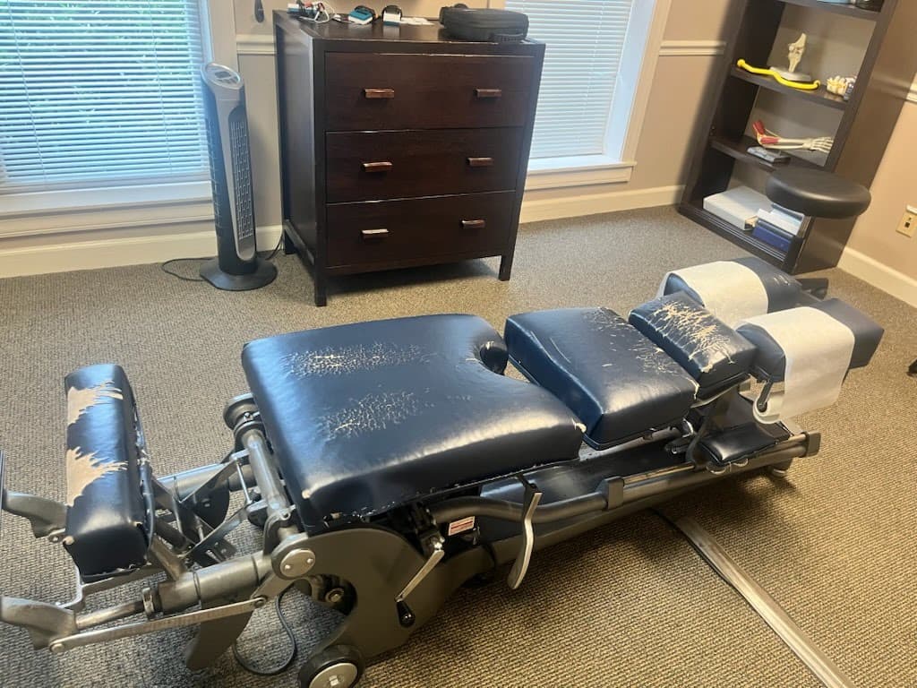 Chiropractic table and headrest before upholstery restoration