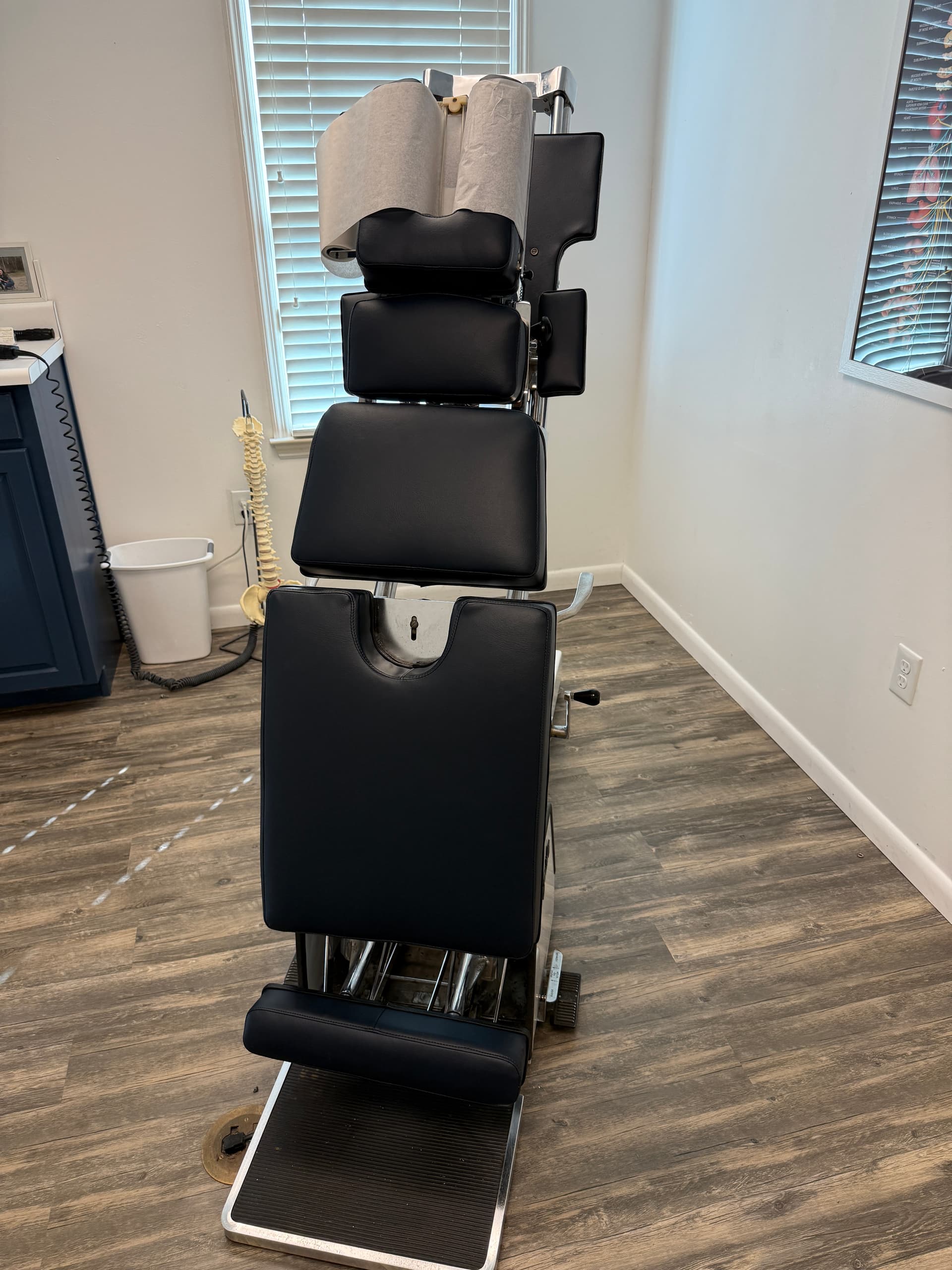 Chiropractic table sections with restored black upholstery