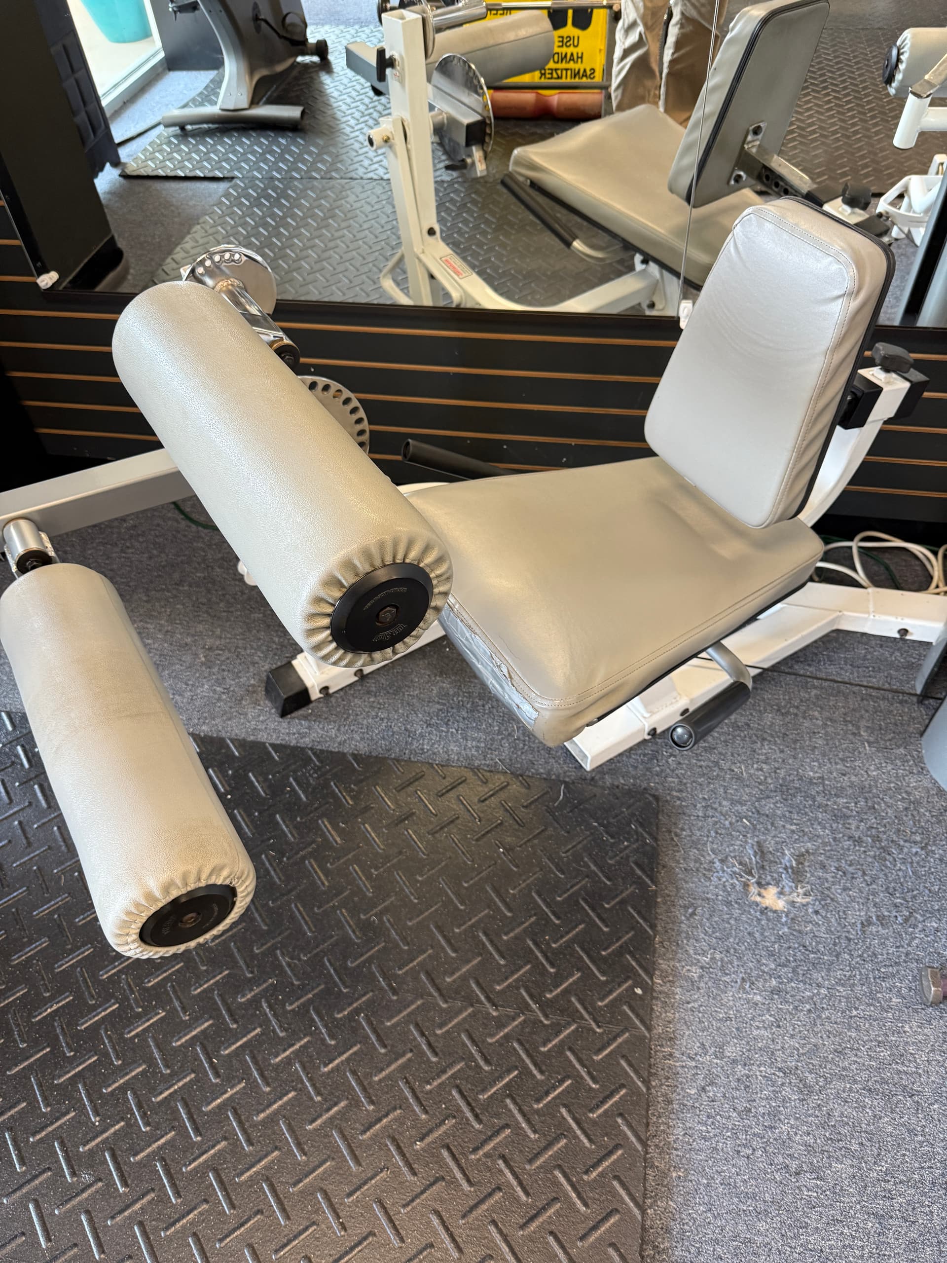 Commercial gym strength station before upholstery restoration