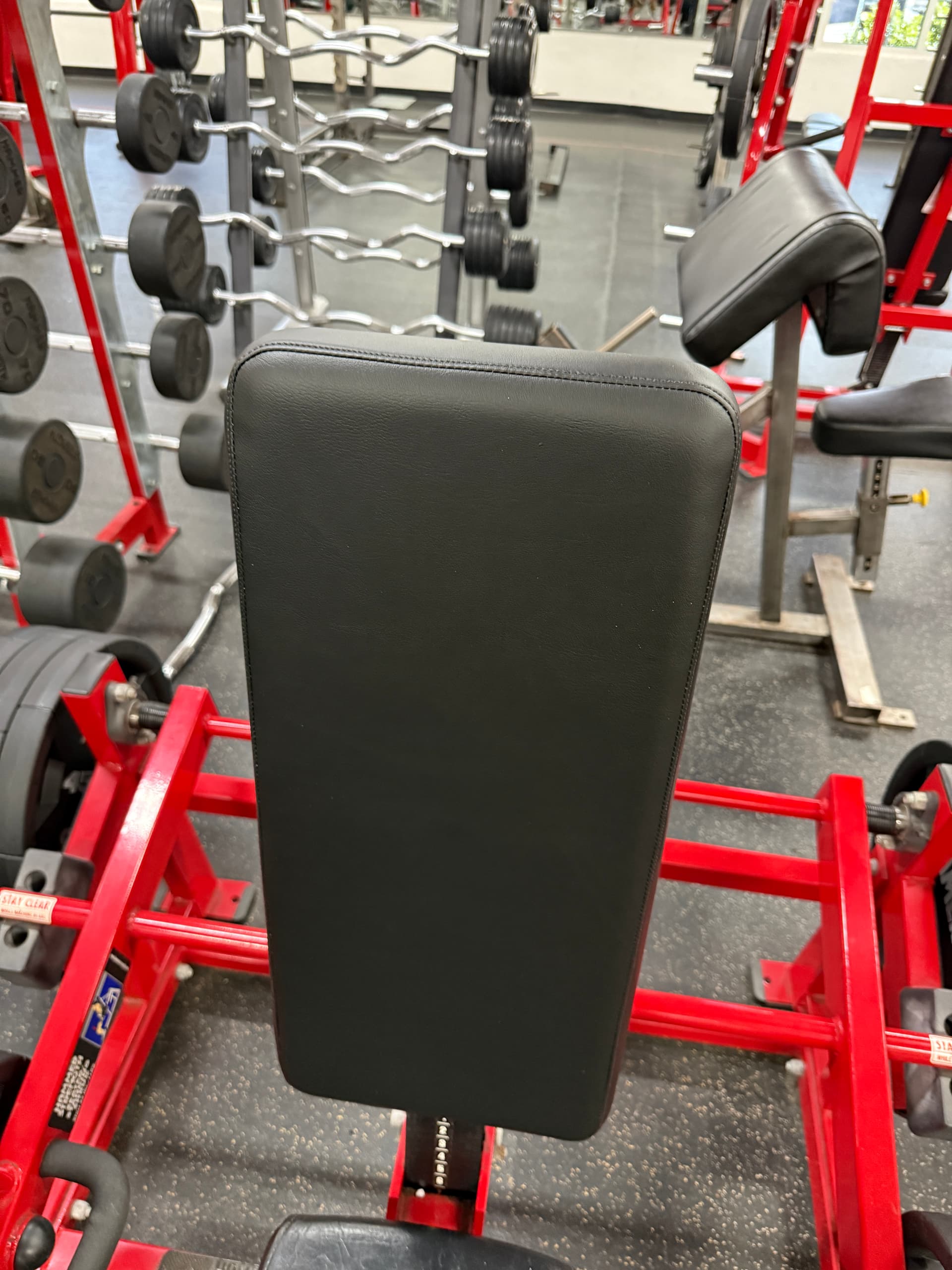 Commercial black strength machine with refreshed upholstery