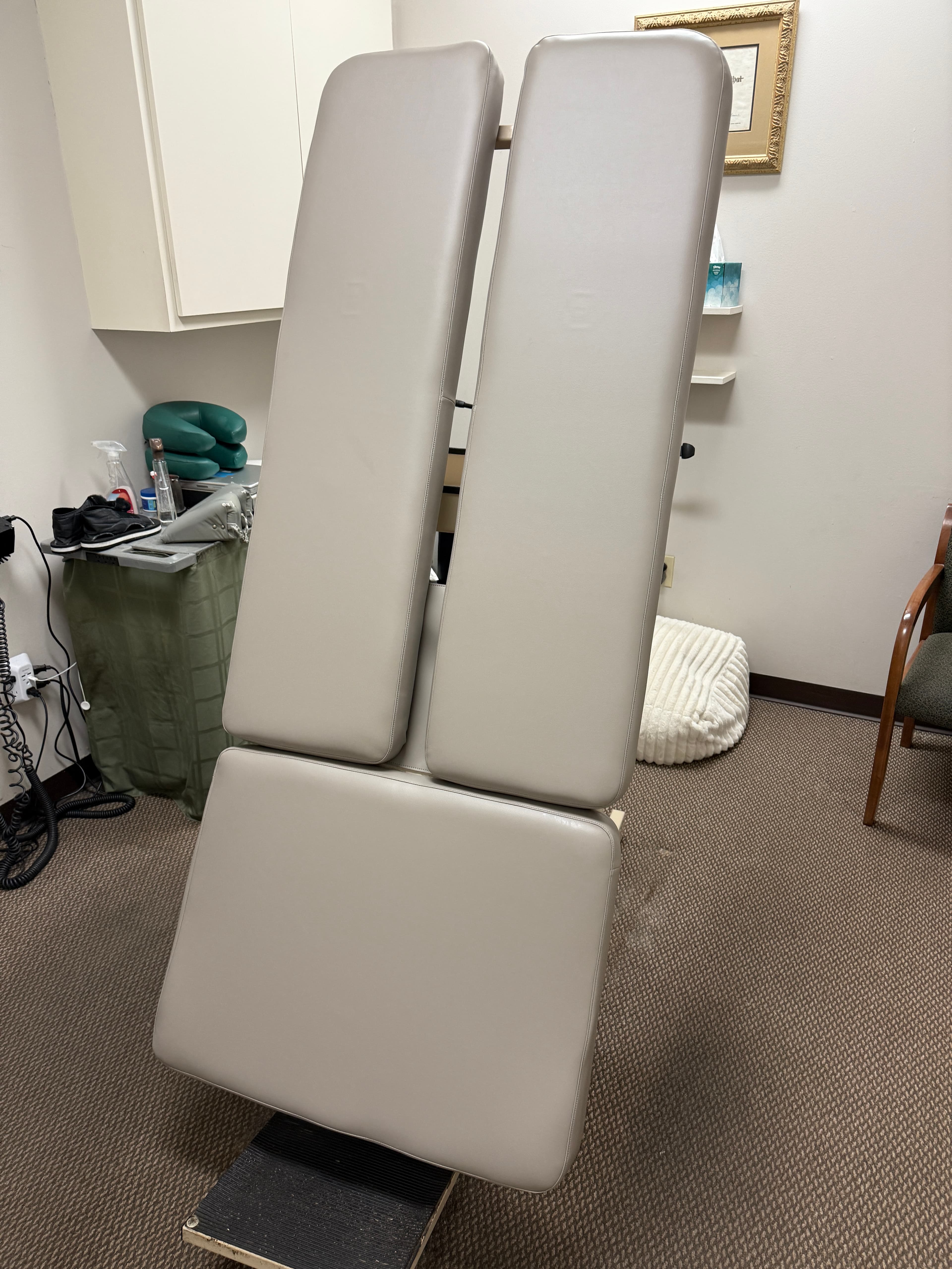 Chiropractic treatment table after Bench Mender upholstery restoration